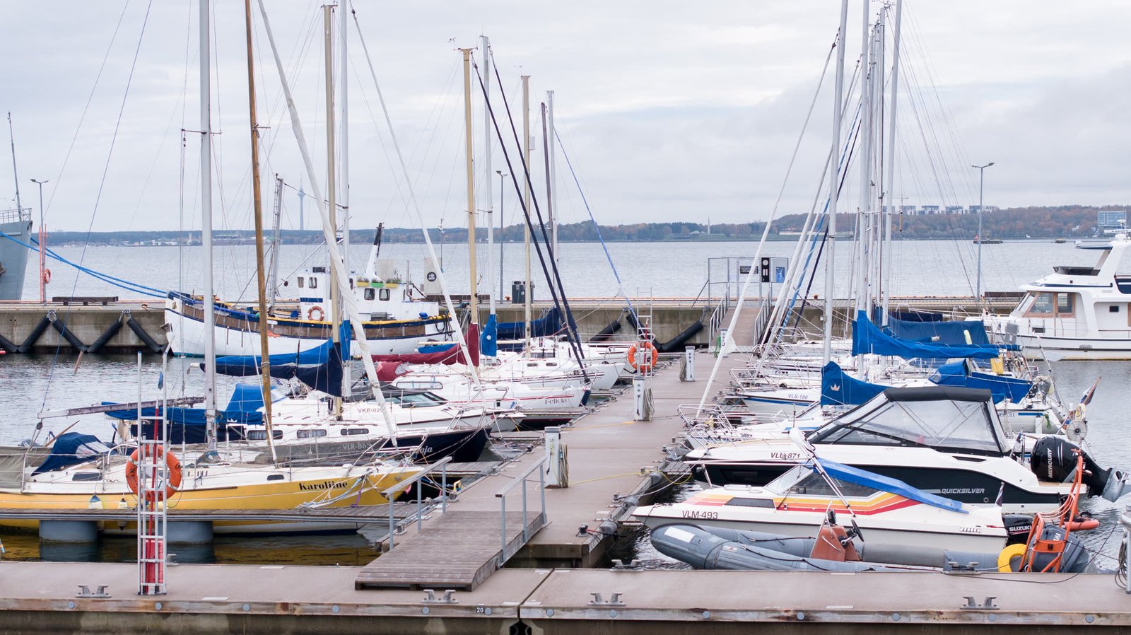 Harbour view from Aqualoft yacht deck — sailboat masts